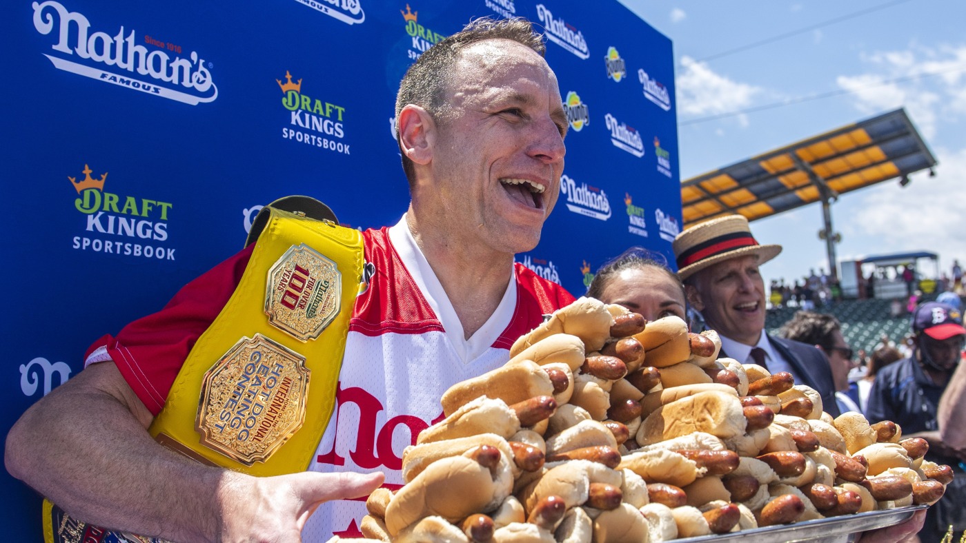 Joey Chestnut returning to Nathan’s Coney Island hot dog contest : NPR
