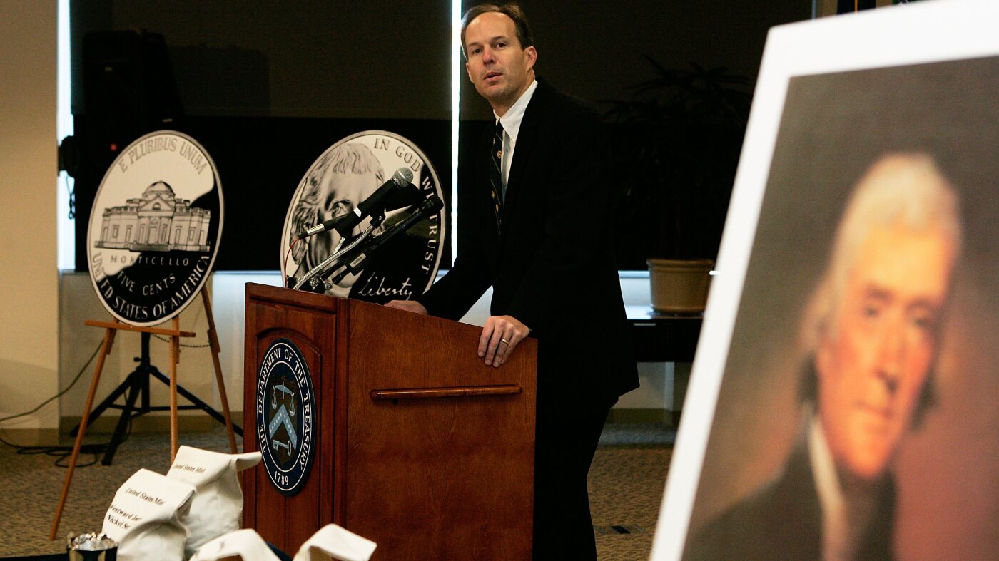 Federal employee of the year awarded to retired Treasury Department official : NPR